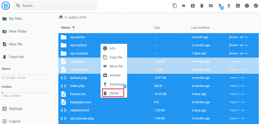 The Delete button highlighted after choosing all files in the public_html file.
