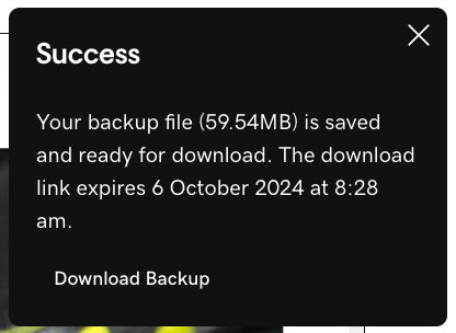 A popup confirming that the backup file is ready to be downloaded from GoDaddy