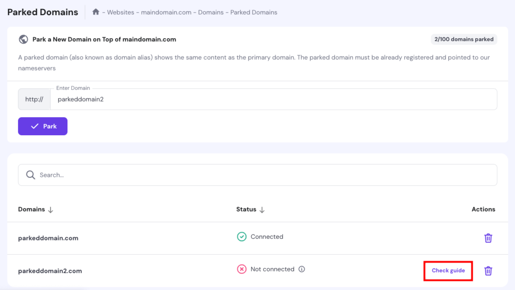 Parked Domains section in Hostinger's hPanel dashboard, highlighting the button to check the guide to complete the parking process